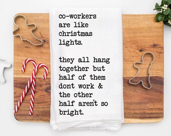Co Workers are like Christmas lights They all hang together but half of them don't work and the other half aren't so bright Kitchen Towel