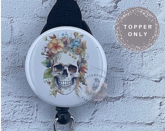 Topper de carrete de insignia de calavera floral
