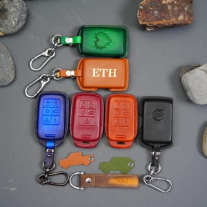 All VOLVO (2006–2025) S60 XC60  XC70 XC90 XC40 EX30 V40 V60 V70  S80 S90 Leather Key Fob Cover – Custom Colors & Personalized Logo Embossed