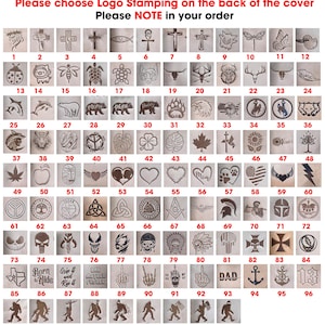 May include: A selection of 105 logo stamp designs, including crosses, animals, and symbols, are displayed on a light brown surface. The text at the top reads, "Please choose Logo Stamping on the back of the cover. Please NOTE in your order."