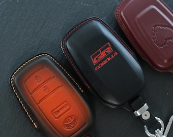 Toyota GR Leather Key Fob Cover for Supra, GR86, GR Corolla, Corolla Cross Hybrid, Yaris, Hilux, Land Cruiser – Custom Logo Smart Key Case