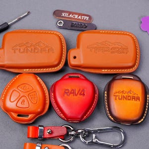 2011-2025 Toyota RAV4 Tundra Tacoma Camry Land Cruiser 4Runner Highlander Key Fob Cover, Key Case Key Chain Entry Remote TRD Key Accessory