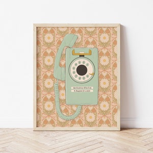 May include: A vintage rotary phone with a green body and a white dial is mounted on a wall with a floral pattern. The phone has a cord and a receiver. The text "Take the telephone off the hook & disappear for a while" is printed below the phone.