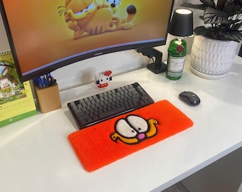 Apoio de pulso para teclado Garfield com textura acolchoada | Suporte para teclado mecânico com um gato laranja preguiçoso e fofo | Decoração de mesa retrô de desenho animado | Tapete divertido para escritório