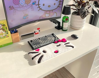 Apoio de pulso para teclado Hello Kitty com textura acolchoada | Suporte fofo e kawaii rosa para teclado mecânico | Tapete decorativo para mesa com tema de anime Sanrio | Presente para gamer