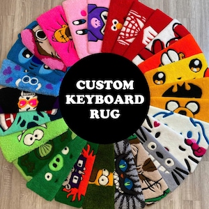 May include: A circular arrangement of rectangular tufted rugs featuring various colourful cartoon character designs. A large black circle in the centre contains the white text CUSTOM KEYBOARD RUG. Each rug displays distinct facial features and vibrant colours.