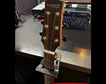 JamClamp! Attach your stringed instrument to any table or desk safely.