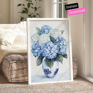 May include: A white framed painting of a blue and white hydrangea bouquet in a blue and white vase. The vase has a floral pattern.