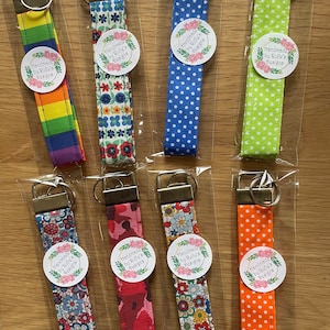 Llavero de pulsera, llavero, llavero, llavero de pulsera, etiquetas de equipaje