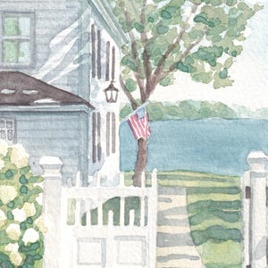 May include: Watercolor painting of a coastal scene featuring a white picket fence, a house with gray siding, and a tree with green leaves. An American flag is attached to the tree. The scene is painted in soft watercolor hues.