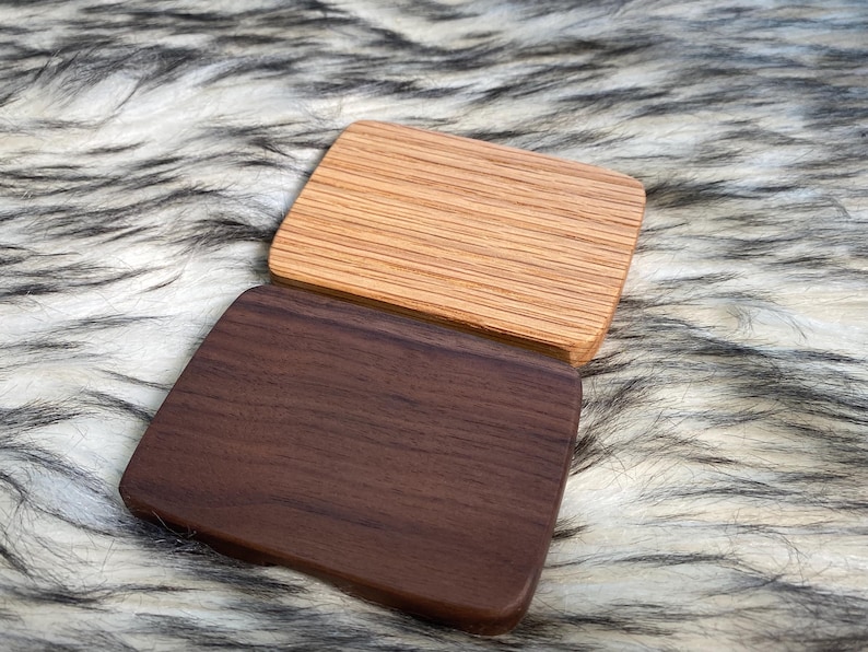 May include: A rustic wooden sign with the text "Welcome to our home" in a handwritten style. The sign features a distressed finish and a simple, inviting design, perfect for a front porch or entryway.