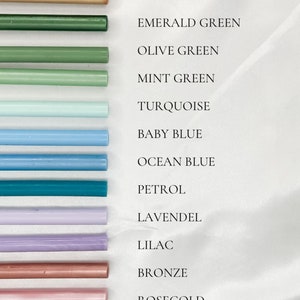May include: A collection of 16 wax seal sticks in various colors, including olive gold, honey gold, light gold, champagne, emerald green, olive green, mint green, turquoise, baby blue, ocean blue, petrol, lavender, lilac, bronze, rose gold, blush pink, pearl pink, and pearl white.