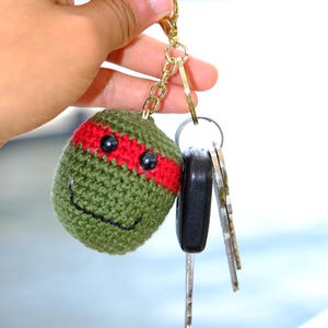 Handgemaakte ninjaschildpad sleutelhanger tasbedel, gehaakt amigurumi-speelgoed, geeky cadeau-idee, kawaii-sleutelhanger, TMNT-accessoire, tmnt-knuffel,