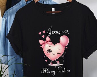 May include: Black t-shirt with a pink heart balloon graphic and the text "Jesus fills my heart".