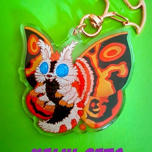 KAI-JUNE CATS : Charm chat Mothra + Carte postale imprimée