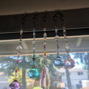 Suncatchers to capture the rays of the sun; sun magic, witchcraft, paganism, sparkles, rainbows,