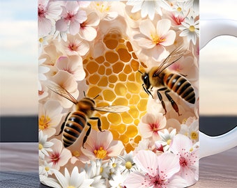 May include: White ceramic mug with a colourful design featuring two bees flying near a honeycomb surrounded by pink and white flowers.