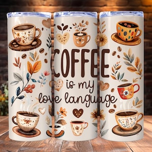 May include: A white tumbler with a brown, black, and orange floral design. The tumbler features the text "COFFEE is my love language".