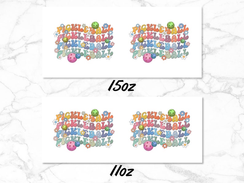 May include: Two white square stickers with a colorful design of the word "Pickleball" in a rainbow of colors with a green, orange, and pink pickleball. The stickers are labeled "15oz" and "11oz".