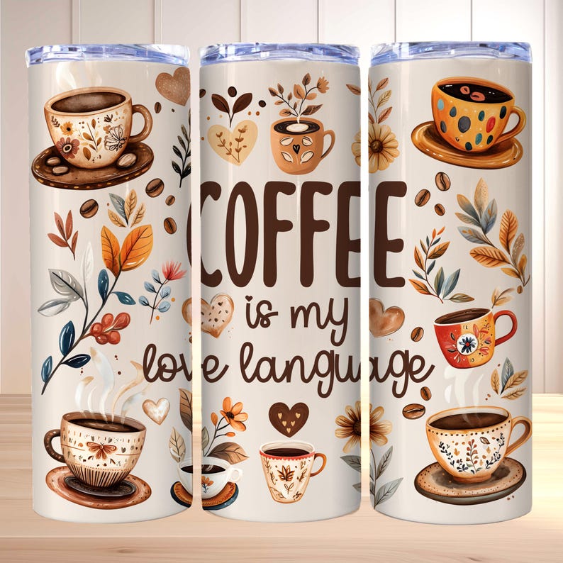 May include: A set of three white tumblers with a cream background and brown floral designs. The tumblers feature a coffee cup with the text "COFFEE is my love language".