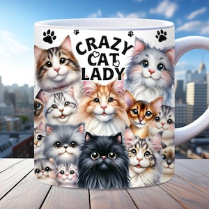 May include: White ceramic mug featuring a colourful illustration of numerous cats surrounding the text "CRAZY CAT LADY".
