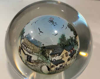 Reverse painted Japanese landscape paperweight, signed by artist! Beautiful to say the least. Attention to detail!