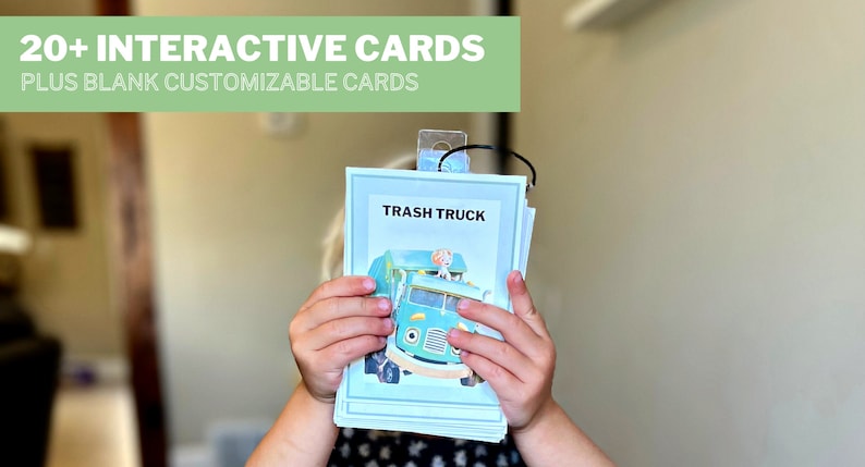 May include: A stack of blue and white interactive flash cards with a picture of a green trash truck on the top card. The text "TRASH TRUCK" is printed on the top card.