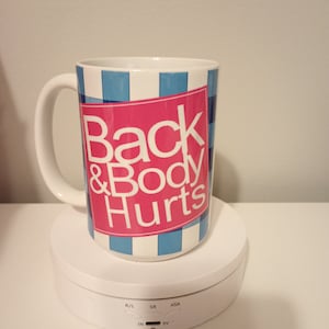 15 oz .Back and Body Hurts ....ceramic mug