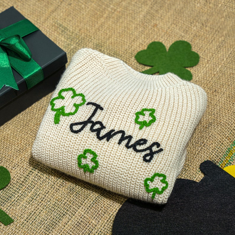 a st patrick's day sweater with shamrocks on it