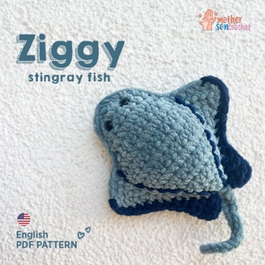May include: Crochet pattern for a blue and navy stingray fish named Ziggy. The pattern is available in English and is a PDF download.