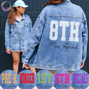 May include: Light blue denim jacket with the text "8TH Mrs. Rachel" printed on the back in white. The jacket has a button-up front and pockets. Below are the words "PRE-K", "KINDER", "1ST", "5TH", and "SPECIALS".