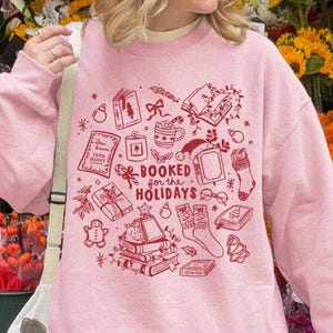 Bookish Christmas Sweatshirt, Pink Christmas Gift For Reader, Booked For The Holidays, Book Lover Gifts, Bookworm Shirt, Reader Crewneck