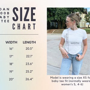 May include: A white baby tee size chart with measurements in inches. The chart includes sizes XS to XL, with corresponding width and length measurements. A model wearing a white tee is shown, with the text indicating the model wears an XS.