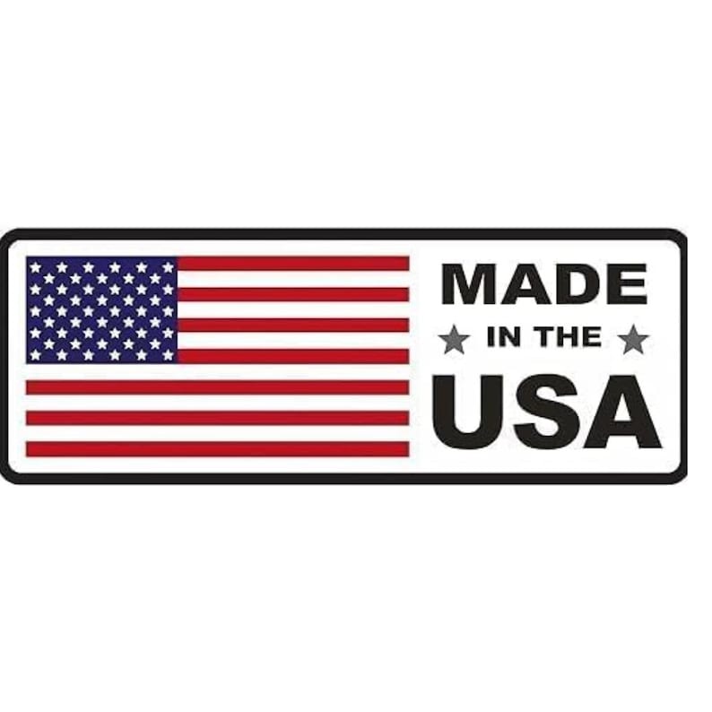 May include: A rectangular sticker displaying the American flag with red and white stripes and a blue field of stars. The text "MADE IN THE USA" is written in bold, black letters.
