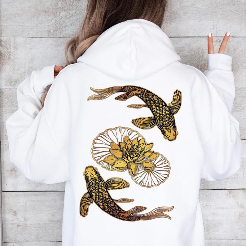 May include: White hoodie with a gold and black graphic of two koi fish swimming around a lotus flower.