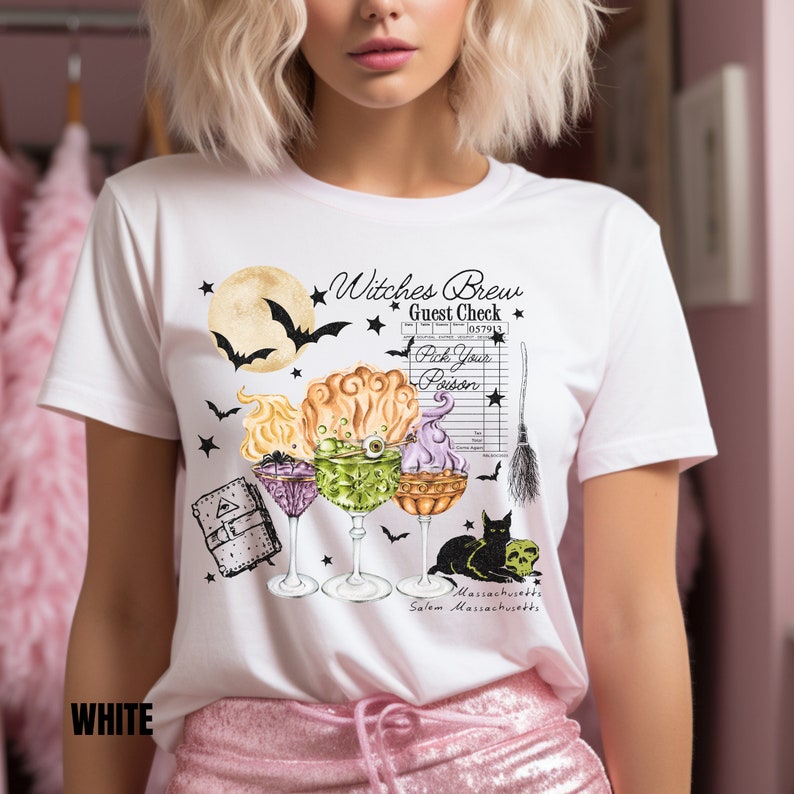May include: White t-shirt with a graphic design of three witch's brew cocktails, a black cat, a broom, and a moon with bats. The text "Witches Brew Guest Check" is printed on the shirt. The text "Pick Your Poison" is printed on a vintage-style receipt.