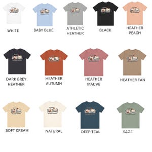 May include: A collection of t-shirts in various colors, featuring a graphic of a cartoon dog wearing a hat and sunglasses. The text on the shirt reads "We only cuddle with friends".