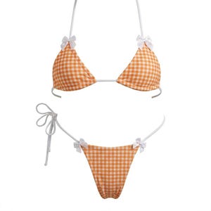 Microkini a quadretti arancioni e crema con pizzo bianco e fiocchi - ABBIGLIAMENTO DA BALLO EXOTIC - RAVEWEAR