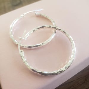 sterling silver diamond cut circle hoop earrings simple faceted hoops great for adding gemstone
