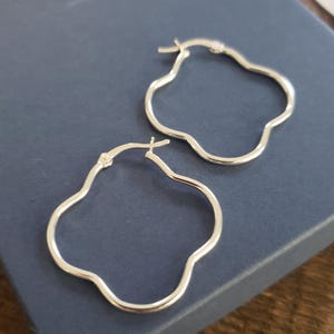 sterling silver flower shaped hoop earrings floral hoops