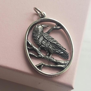 sterling silver raven pendant in oval frame, talisman charm, nature, forest