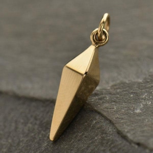Medium spike charm pendant bronze finish. Spike pendant