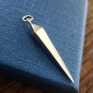 Long spike charm pendant 925 sterling silver finish. Spike dagger pendant 35x6mm