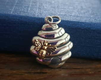 sterling silver beehive charm with a bronze bee botanical garden pendant, nature jewelry