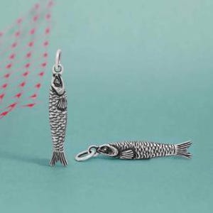 May include: Two silver fish charms. One charm is upright, the other is lying down. The fish have detailed scales, fins, and eyes. The charms are designed to be used as pendants or additions to a bracelet.