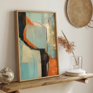 May include: Abstract painting in a wooden frame with a blue, orange, and gold color scheme. The painting is hanging on a wall with a wooden shelf below it.