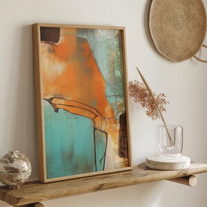 May include: Abstract painting in a wooden frame with orange, blue, and brown colors. The painting is hanging on a wooden shelf with a vase and a decorative object.
