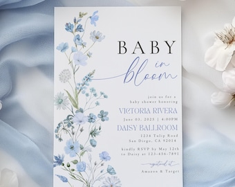 May include: A baby shower invitation with a watercolor floral design in shades of blue and white. The invitation reads "Baby in Bloom" and includes the details for the event, including the date, time, location, and RSVP information.