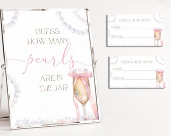May include: A white sign with pink text that reads "Guess how many pearls are in the jar". The sign is surrounded by pearl necklaces and a glass jar with pearls inside. There are four white cards with the text "Guess how many" and lines for a name and guess.