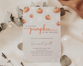 May include: A baby shower invitation with a light grey background and a pumpkin theme. The invitation features a watercolour illustration of pumpkins and white flowers. The text reads "A little pumpkin is on the way." The invitation also includes the date, time, and location of the baby shower. The text reads "Join us for a baby shower honouring Savannah Smith, October 06, 2024 at 3PM, The Pumpkin Patch, 123 Anywhere St, Any City, Seattle WA. Kindly RSVP to Ana at 123-456-7891. Registered at Target and Amazon."